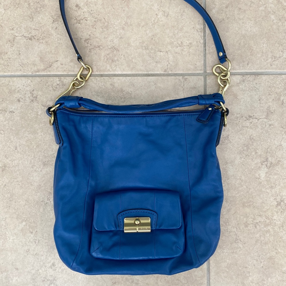 Coach messenger bag gently used sm stain inside